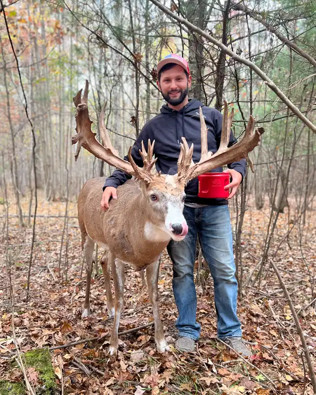 posing with a buck